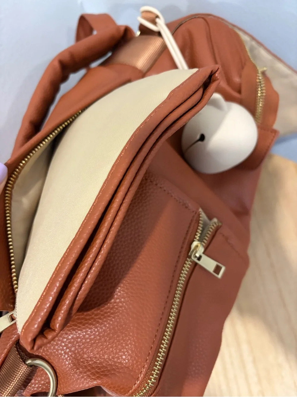 Tan Leather Backpack with Gold Accents - Brand: Unknown